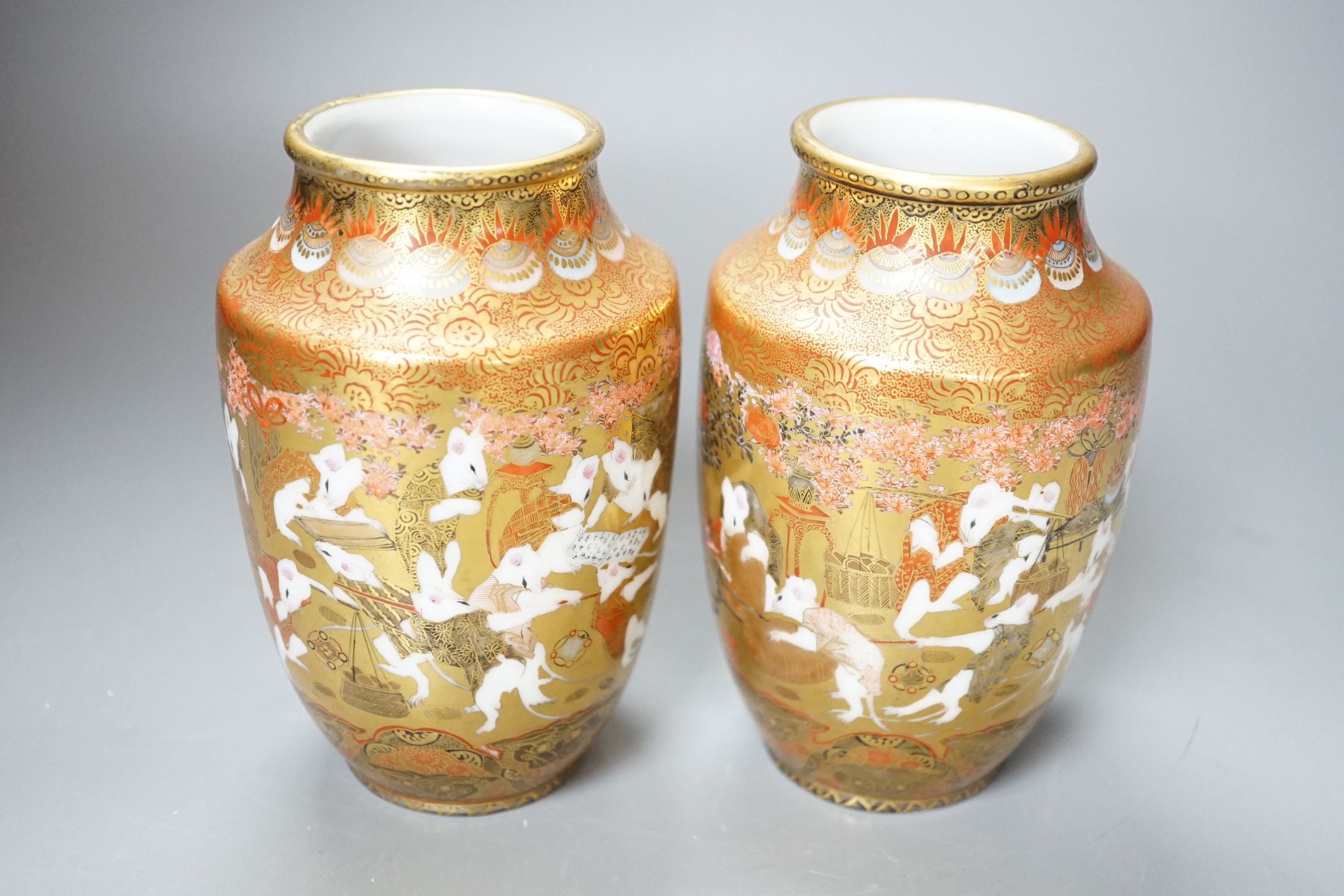 A pair of Kutani type porcelain vases, height 15 cms.